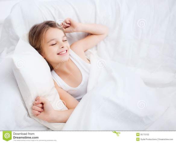 smiling-girl-child-waking-up-bed-home-health-beauty-childhood-concept-35775152